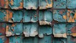 a close up of a rusted metal surface with blue and orange paint peeling off of the side of it.