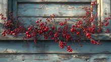 A Bunch Of Red Berries Sitting On Top Of A Wooden Window Sill Next To A Window Sill With Peeling Paint On It.