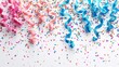 Curled ribbons in pink and blue hues entwine with a burst of colorful confetti on a white surface.