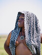 Attractive African American Woman Outdoors With Cloth Over Her