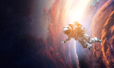 Wall Mural - astronaut at spacewalk. mixed media