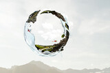 Fototapeta Kosmos - Green sphere landscape with grass and clear water