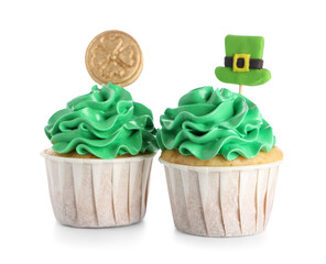 Tasty green cupcakes for St. Patrick's Day on white background