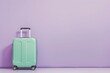 a green suitcase is sitting in front of a purple wall