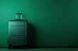 a green suitcase is sitting in front of a green wall