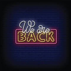 Wall Mural - Neon Sign we are back with brick wall background vector