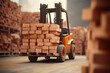 Forklift truck with bricks in warehouse. Logistics and transportation concept