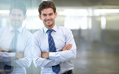 Wall Mural - Businessman, portrait and happy with arms crossed in office for professional career in finance, confidence and pride. Entrepreneur, face of employee and smile for relax, break or mockup space at work