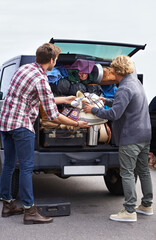 Wall Mural - Men, friends and luggage in car trunk on road trip or camping outdoor for holiday, vacation or adventure. Male people, bags and unpacking boot or transportation together in Europe, journey or travel