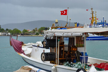 Wall Mural - fishing boats in the harbor at izmir, cesme