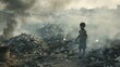 A poor little boy stands in a smoking dump on the outskirts of a slum. Poverty and hunger concept. Help hungry children. 