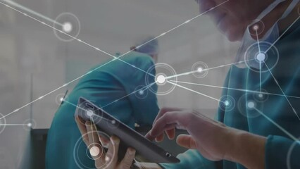 Poster - Animation of connections over caucasian male surgeon using tablet in hospital