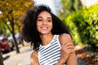 © deagreez - Photo of cheerful dreamy shiny girl dressed white striped top walking smiling enjoying sunny warm autumn weather outdoors in town park