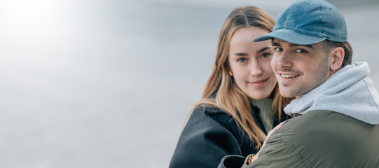 Sticker - portrait of young couple on the street with copy space