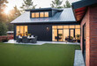 Cozy beautiful house in barnhouse style. Wood, red brick and black metal were used in construction. Practical and simple home design with copy space,