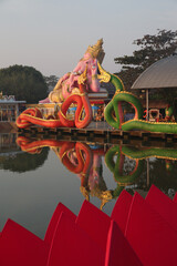 Wall Mural - Pink Ganesh (Ganesha). Wat Saman Rattanaram Temple: Buddhist temple in Chachoengsao Province, Thailand. Religious traditional national Thai architecture. Beautiful landmark, architectural monument