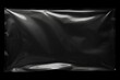 © ravindu - Transparent plastic wrap texture on black background for branding mock up.