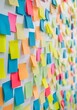 © James Ellis - Blue wall full of colorful sticky notes