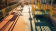Sunlight and shadow on surface of different walkway level of modern outdoors playground equipment on rubber floor in playground area at kindergarten