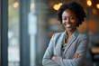 Confident African American businesswoman with a welcoming smile in a modern office setting