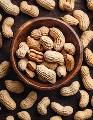 Wall Mural - peanut peeled in wooden bowl, top view. high detail

