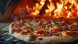 Fototapeta  - Close up of freshly baked Italian pizza in a wooden oven on blurred background