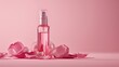 A transparent, beautiful bottle of face serum without a brand stands on a light pink minimalistic background