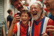 Group of excited soccer fans taking a selfie with a smartphone at a game