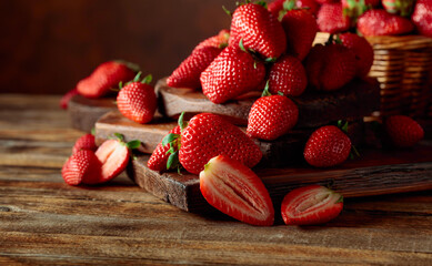 Wall Mural - Fresh strawberries on an old wooden table.