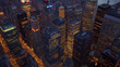 Aerial shot of multiple skyscrapers forming the bustling downtown of a major city, vibrant lighting and dynamic angles showcasing the density and energy of urban development