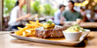 Steak mit Pommes und Kräuterbutter im Hintergrund ein Restaurant mit fröhlichen Gästen 