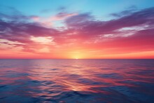 A Beautiful Sunset Over The Ocean With Vibrant Colors
