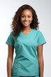 A young female doctor or nurse wearing green scrubs