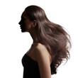 Portrait of a brunette girl with voluminous wavy hair. Side view.