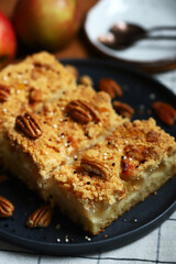 Wall Mural - Pieces of delicious apple pie on a plate.