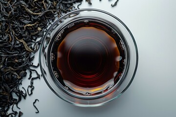 Wall Mural - Tea in a transparent glass. Background with selective focus and copy space