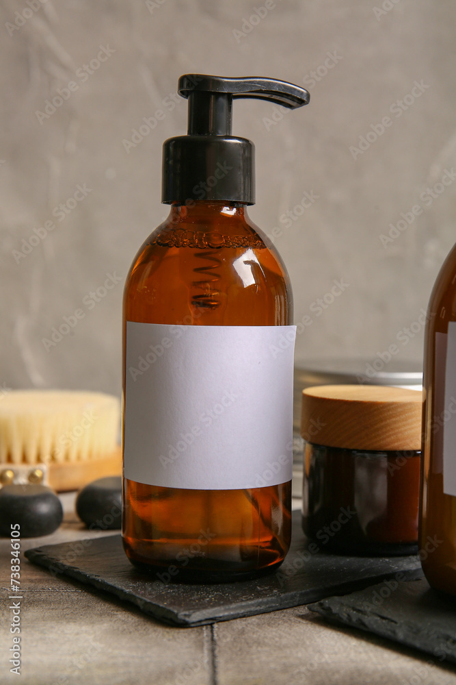 Bottle of shampoo on table