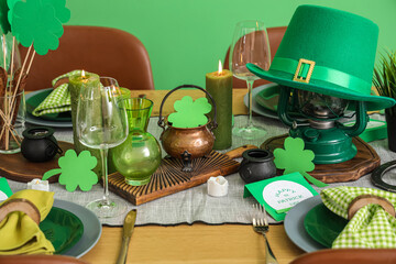 Wall Mural - Festive table serving with leprechaun's hat and decorations for St. Patrick's Day celebration