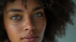 © c80 - A captivating portrait of a young woman with striking eyes, full lips, and delicate features, framed by perfectly groomed eyebrows and long eyelashes, showcasing the beauty and intricacy of the human