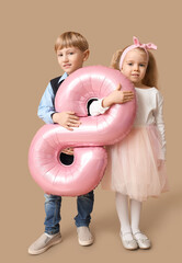 Poster - Cute little children with pink air balloon in shape of figure 8 on brown background. International Women's Day