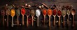 Various of colorful herbs and spices in spoons for cooking on wooden table. Asian, Italian or Indian seasoning. Cumin, chili pepper, curry powder, salt, pepper, garlic, cinnamon. Flat lay, top view