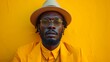 © rodrigo - gay black man from the lgbt community posing in yellow