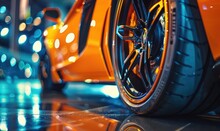 Closeup Photo Of Orange Sports Car Rims. Selective Focus