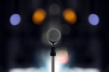 Wall Mural - Microphone for press conference speaker report interview concepts or broadcasting public speaking speech presentation stage performance and reporter news with empty copy space background.