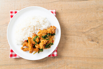 Sticker - stir-fried fried fish with basil and chili in thai style topped on rice