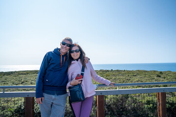 Poster - A happy couple embraces along Western Australia coastline