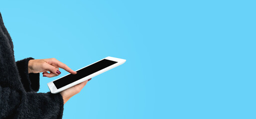 Poster - Woman finger touch tablet mock up screen, copy space background