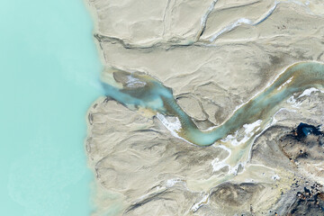 Wall Mural - drone view of the azure lake in the glacier valley. view of the moraines. landscape from the air. ri
