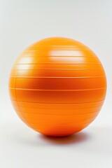 Poster - An orange exercise ball on a white surface. Suitable for fitness and exercise related concepts