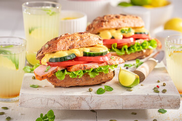 Canvas Print - Homemade sandwich with curry chicken, cheese and chive.